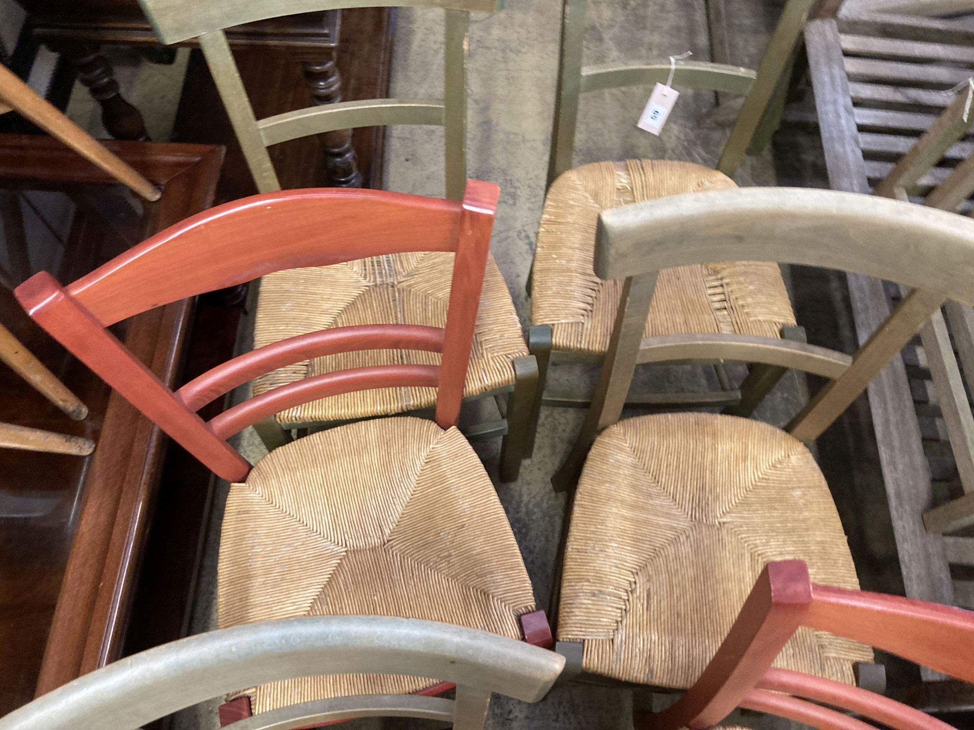 Six (four plus two) French stained beech rush seated dining chairs